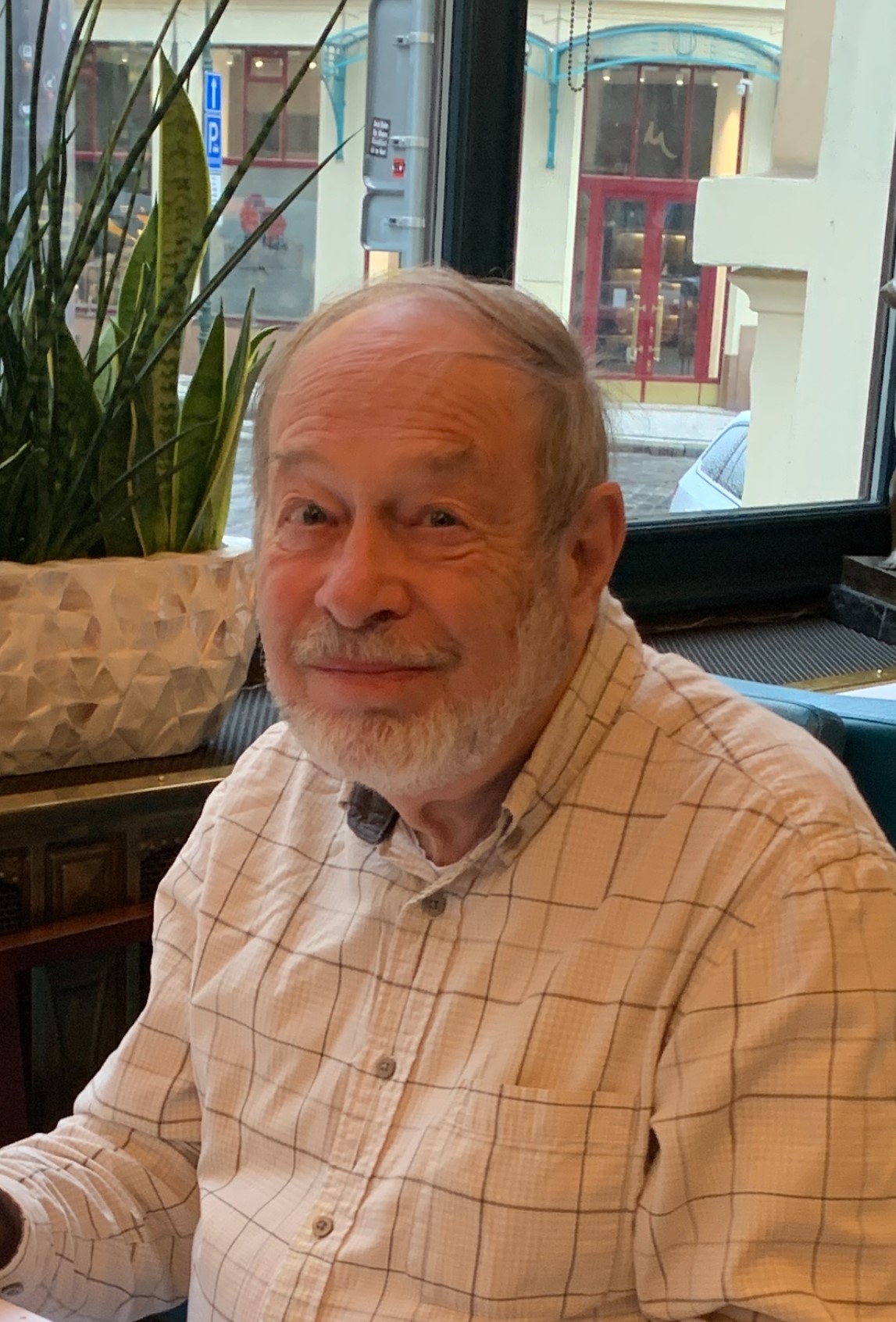 Allan VE7BRD and Janice VA7JMO present the award to Rick Bennett's VA7RLB(SK) family: Josie VA7JOP, Roselle VA7RXR and Rose-Mary VA7ROZ