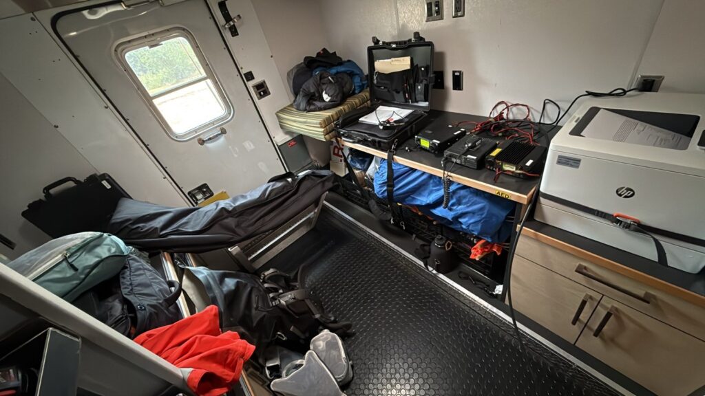 Inside NS1: operating position, packet gear, and my overnight accommodations.